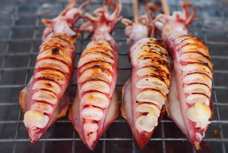 Grilled squid in the market, Thaiandの写真素材