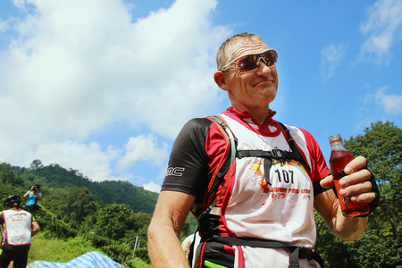 Chiang Rai, Thailand - October 23, 2015: Sunvo Untimate Adventure Challenge 2015. A wilderness adventure racing through trail running, mountain biking, swimming, kayaking and more in the lush jungles.のeditorial素材