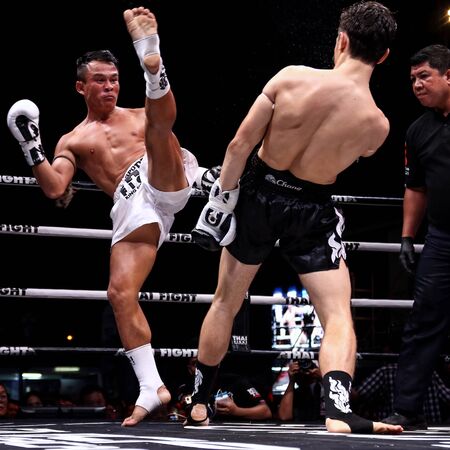 Nakhon Pathom, Thailand - November 21, 2015: Thai Boxer in World Muay Thai Fight 2015 King Cup. Semifinals at Royal Police Cadet Academy.のeditorial素材