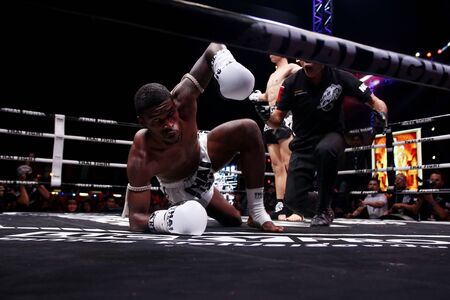 Nakhon Pathom, Thailand - November 21, 2015: Thai Boxer in World Muay Thai Fight 2015 King Cup. Semifinals at Royal Police Cadet Academy.のeditorial素材