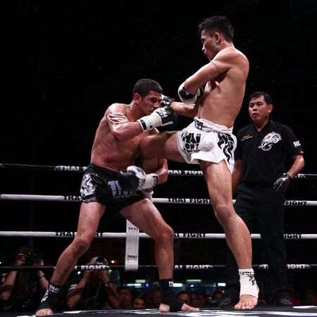 Nakhon Pathom, Thailand - November 21, 2015: Thai Boxer in World Muay Thai Fight 2015 King Cup. Semifinals at Royal Police Cadet Academy.のeditorial素材