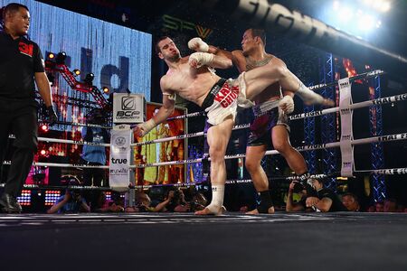 Bangkok, Thailand - December 31, 2015: Thai Boxer in World Muay Thai Fight 2015 King's Cup. Finals of the  King's Cup at Central World.のeditorial素材