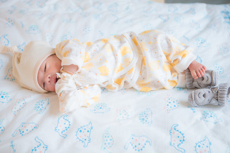 Newborn asian baby asleepの写真素材