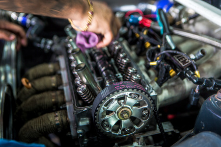 Mechanic checking the timing beltのeditorial素材