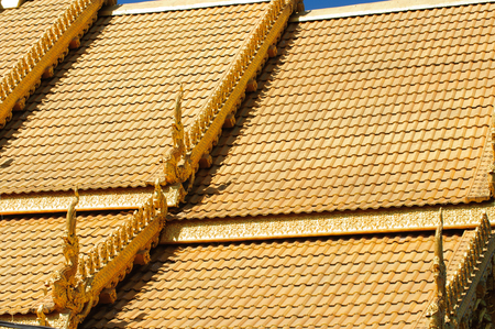 Close up of decorated church roof of Wat Si Pan Ton, Thailandの写真素材