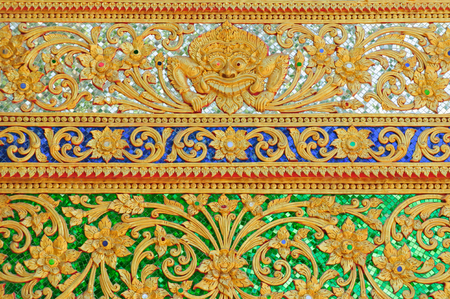 Thailand-November 5, 2015:Close up of decorated wall in front of Wat Si Pan Tonの写真素材