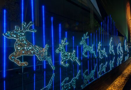 BANGKOK THAILAND - DECEMBER 07 : Christmas decorated with deer for Merry Christmas & Happy New Year 2014 at Peninsula plaza on December 29, 2013 in Bangkok, Thailand.のeditorial素材