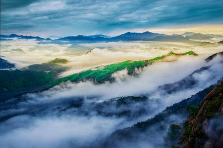 The scenery of sunset and sea of clouds in the Erlong Mountain of Funiu Mountain in Nanyang, Henanの写真素材
