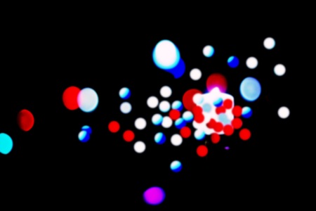 Abstract circular bokeh background of candlelight and Christmaslightの写真素材