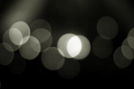 Abstract circular bokeh background of candlelight and Christmaslightの写真素材