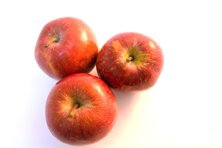 closeup apple fruit with water drop on white backgroundの写真素材