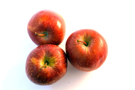 closeup apple fruit with water drop on white backgroundの写真素材