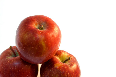 closeup apple fruit with water drop on white backgroundの写真素材