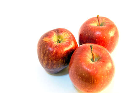 closeup apple fruit with water drop on white backgroundの写真素材