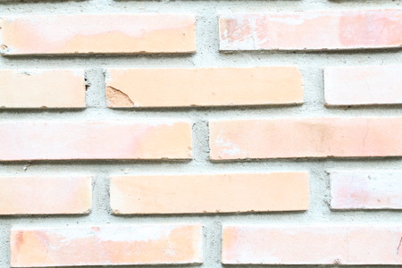 grunge background, red brick wall texture bright plaster wall and blocks road sidewalk abandoned...