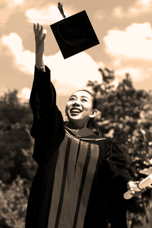 Students with congratulations graduation celebrating and happy girl student on blackwhite tone.の写真素材