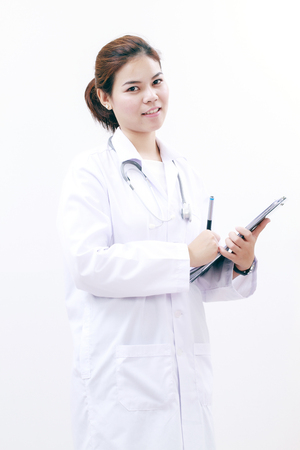 Smiling medical doctor woman asia with stethoscope and clipboard,on white backgroundの写真素材
