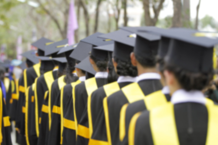 Graduates are walking the line to get a diploma and selective focus.の写真素材
