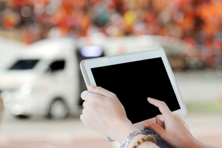 close up asia women using tablet and doctor using touch pad on ambulance car backgroundの写真素材