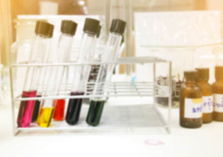 blurry of sample Test tubes on stand in lab ,vintage toneの写真素材
