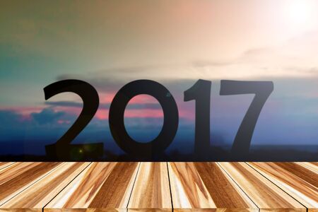 Perspective wood and Empty top wooden of sunset on mountain and and 2017 years while celebrating new...