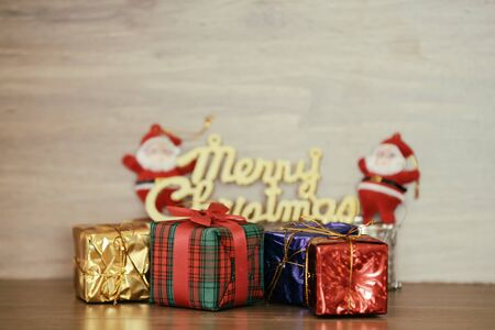 Merry Christmas message on wooden background