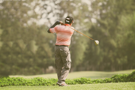 golfers hit sweeping and keep golf course in the summer  for relax time
