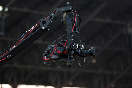 Soft focus and blurry of Professional cameraman and Video camera operator working with his professional equipmentの写真素材