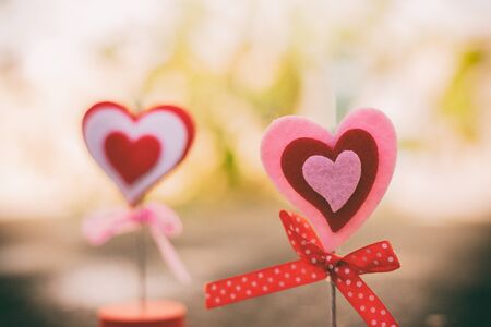 Vintage tone of Heart standing on concrete floor for valentine day ,love and romantic conceptの写真素材