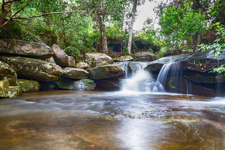waterfall in deep forest in thailandの写真素材