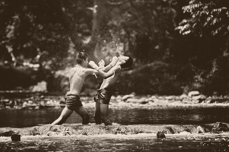 Muay thai or Thai boxing at Thailand ,black and white with gainの写真素材