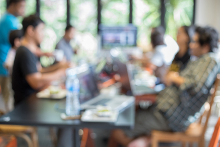 business people meeting in office in blurry for background