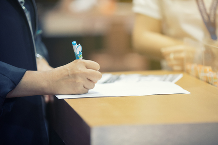 Businessmen are signing financial contracts An Official Documentの写真素材