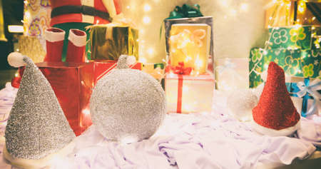 Happy new year 2018 and ornaments on the Christmas tree with gift boxの写真素材