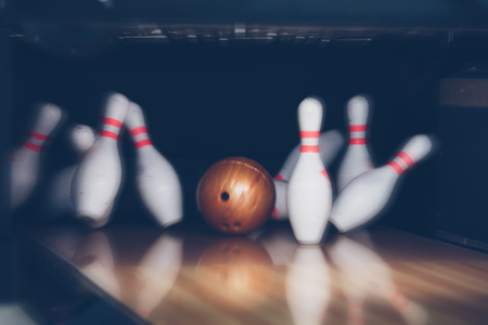 motion blur of bowling ball skittles on the playing fieldの写真素材