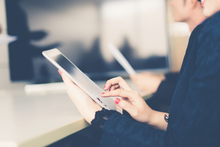 businessmen and group using notebook and tablet for business partners discussing documents and ideas at meetingの写真素材