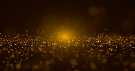 Abstract Gold Particle and gold bokeh backgroundの写真素材