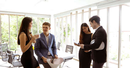 businessmen and Engineer group using notebook for business partners discussing documents and ideas...