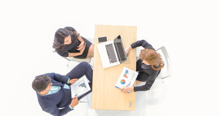 Startup young business people group working in modern office together. small group discussing...