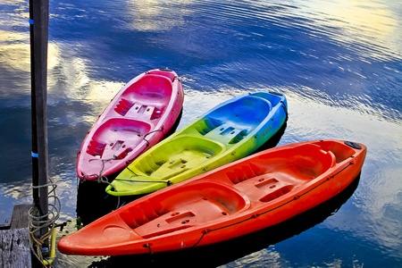 beautiful scenery ,wooden floor with some boats in lake,thailandの写真素材