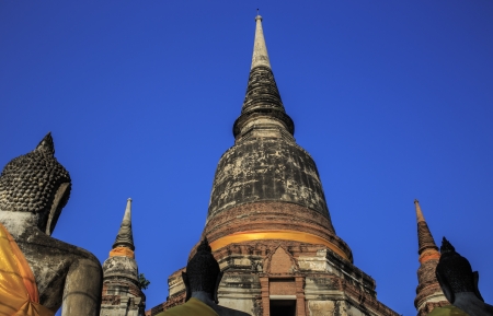 ancient temple in Wat Yai Chai Mongkol after sunsetの写真素材