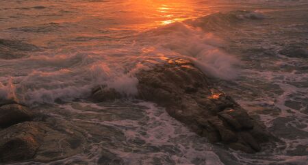 Beautiful sunset and sea waves of the natural の写真素材