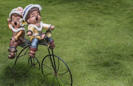 Teddy boys and girls on the bike の写真素材