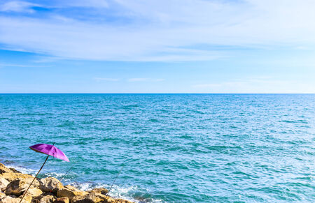  Cloudy blue sky above turquoise sea の写真素材