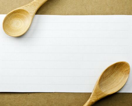 Paper festivities with a wooden spoonの写真素材