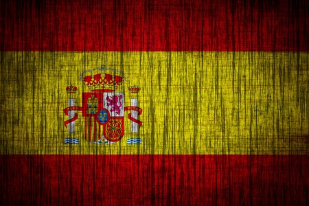 Spain flag on wood textureの写真素材