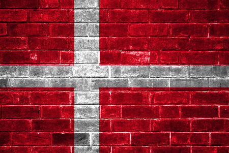 Denmark flag painted on a brick wallの写真素材
