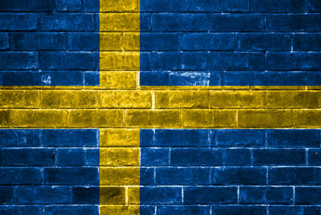 Sweden flag painted on a brick wallの写真素材