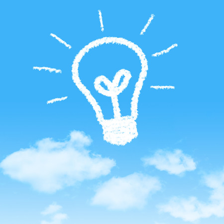 cloud icon with design on blue sky backgroundの写真素材