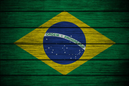 brazilian flag on Background texture woodの写真素材